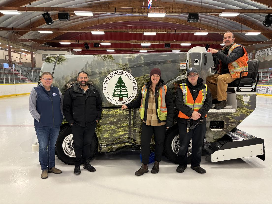 PRC staff with new electric zamboni